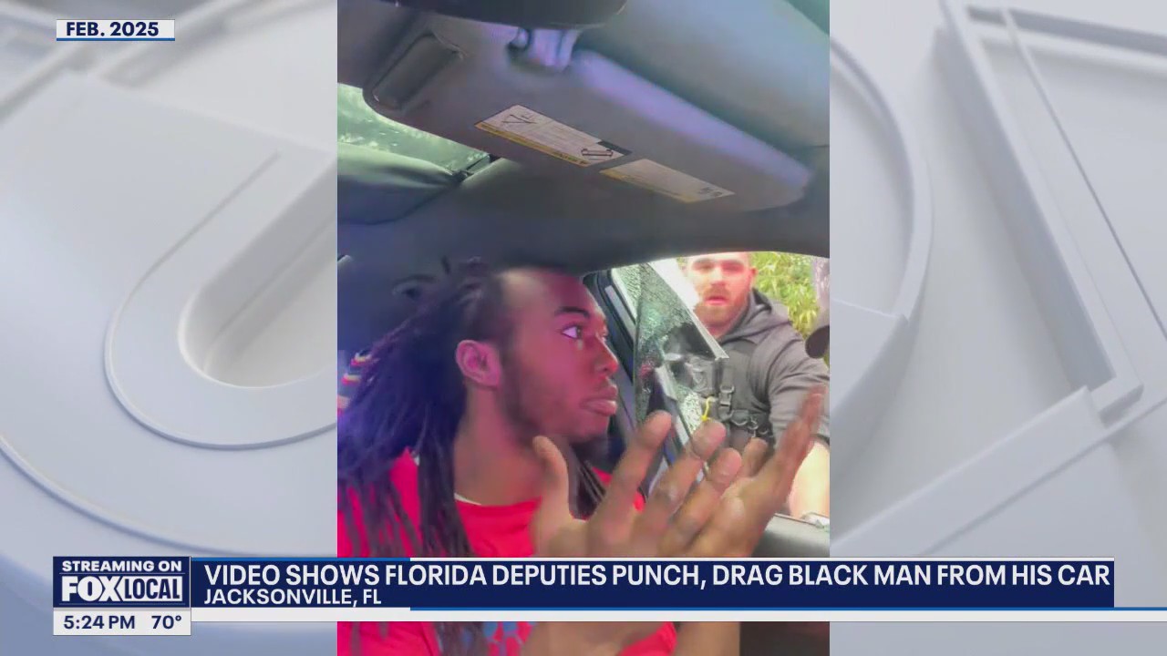 Video shows deputies punching, dragging man from car