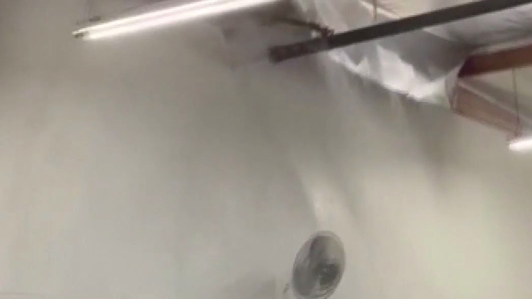 Rare CA storms tear holes in roofs, flood roads