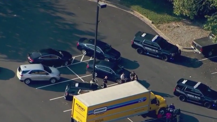 Two arrested, officer hurt in crash with DeKalb police at Home Depot