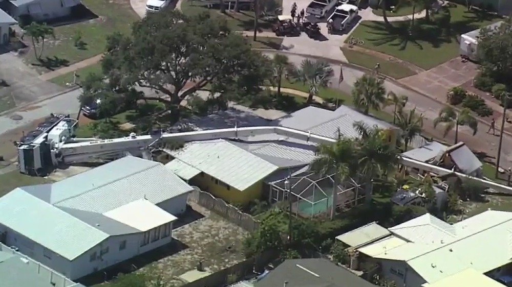 Crane falls on Merritt Island home, SKYFOX shows damage
