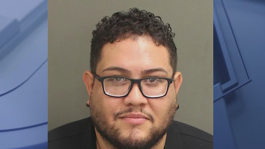 Man arrested after allegedly pointing gun at family during road rage