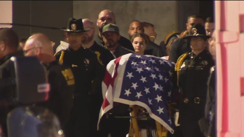 Procession for slain parole agent in Oakland