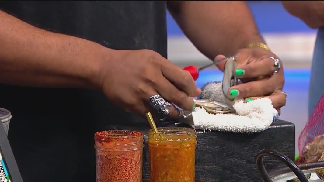 Shucking oysters with Chef Rickie Perez