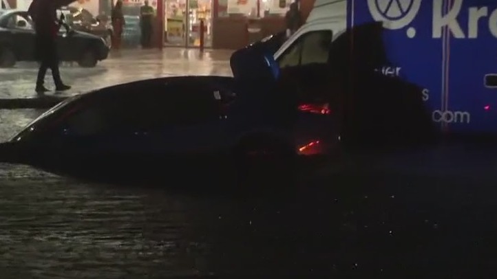 Vehicles submerged in water after Eustis flooding