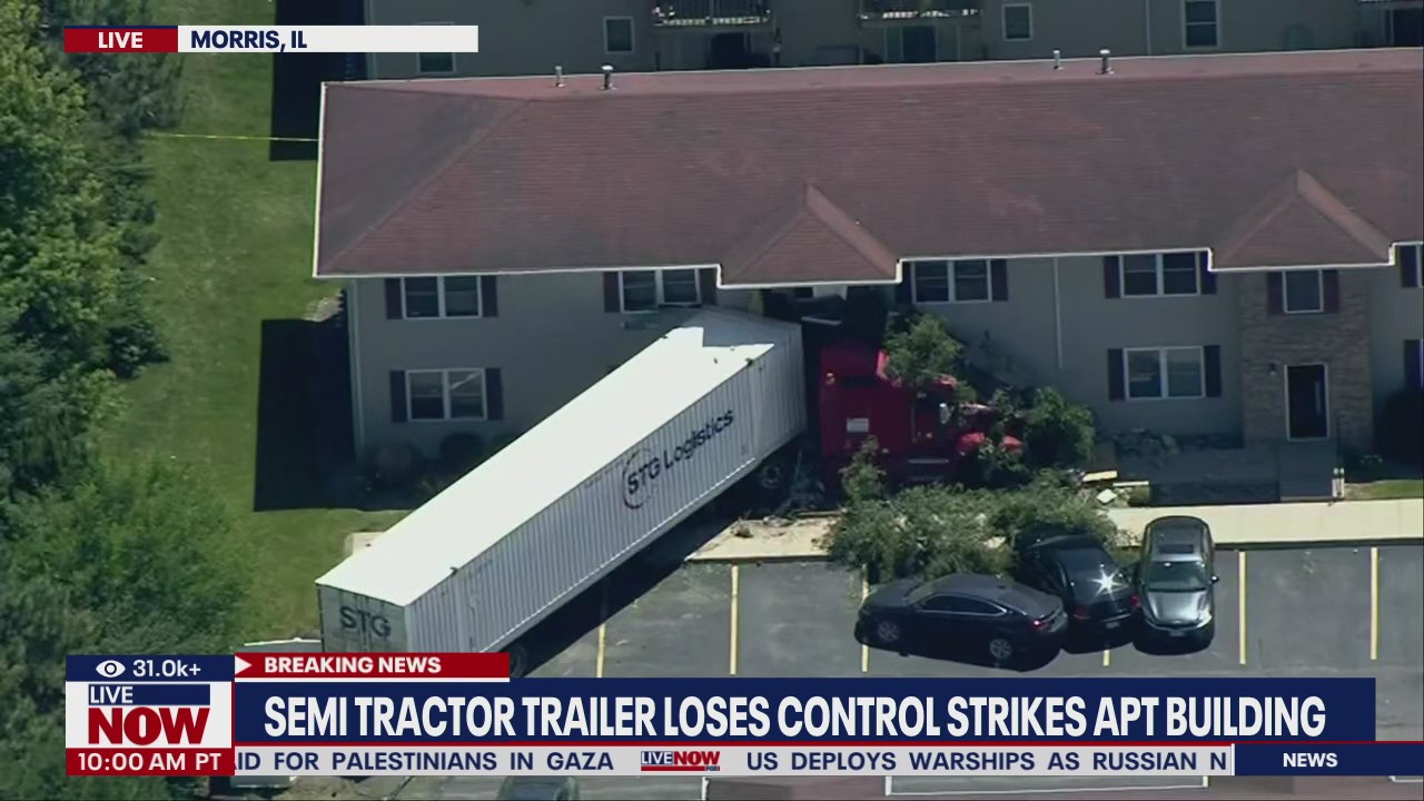 WATCH: Semi truck slams into apartment