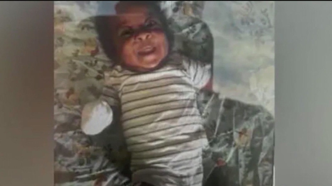 Search for 6-month-old continues; father under scrutiny