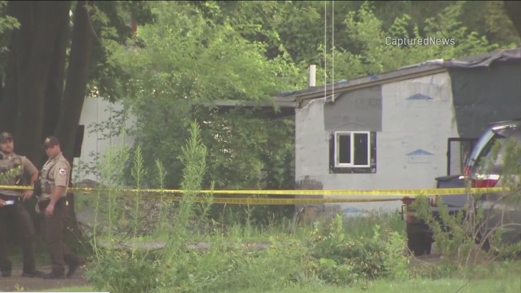 Manhunt underway after 2 found dead in LaSalle County house fire