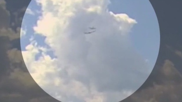 Two planes nearly collide mid-air