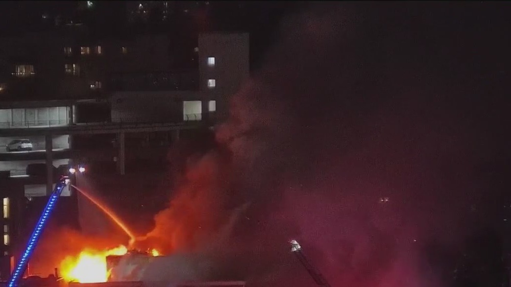 Unsiccected residential building in Oakland is on fire