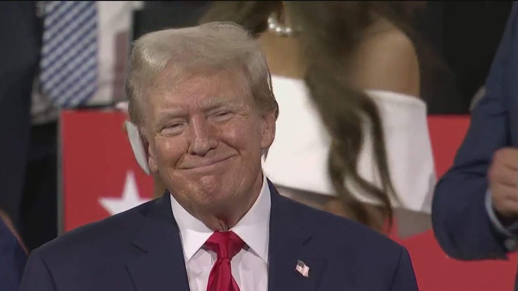 Trump enters Republican convention with a bandage covering his right ear after assassination attempt