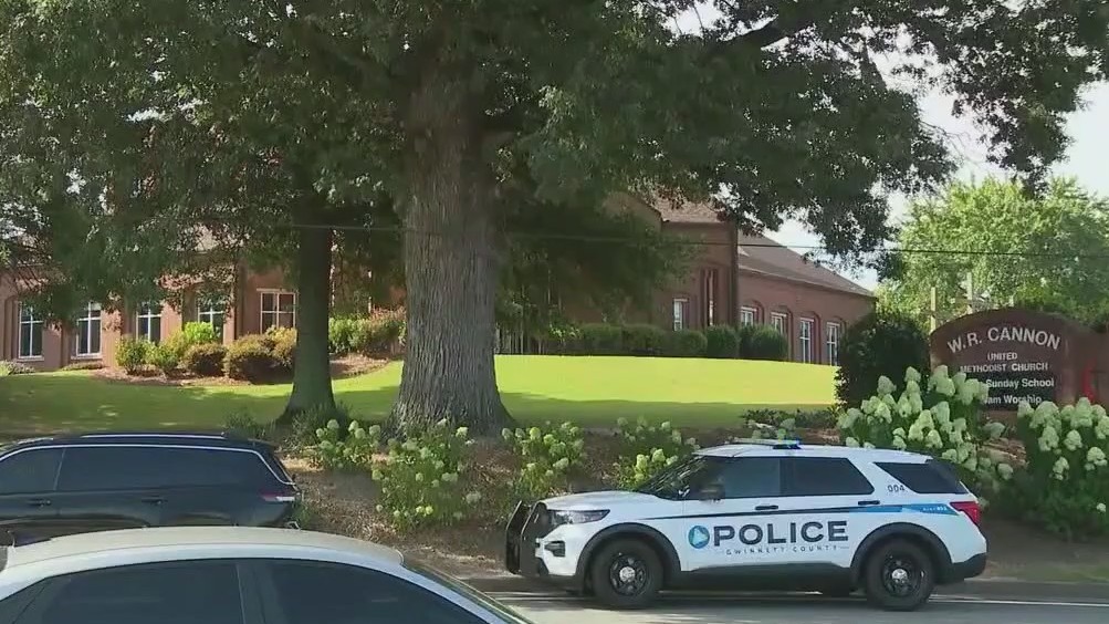 Police investigate after body found in church parking lot