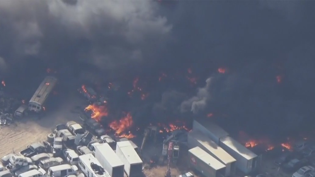 Hundreds of cars on fire at recycling center