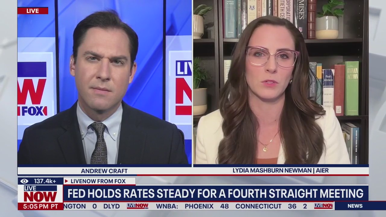 Trump slams Powell as Fed holds rates steady