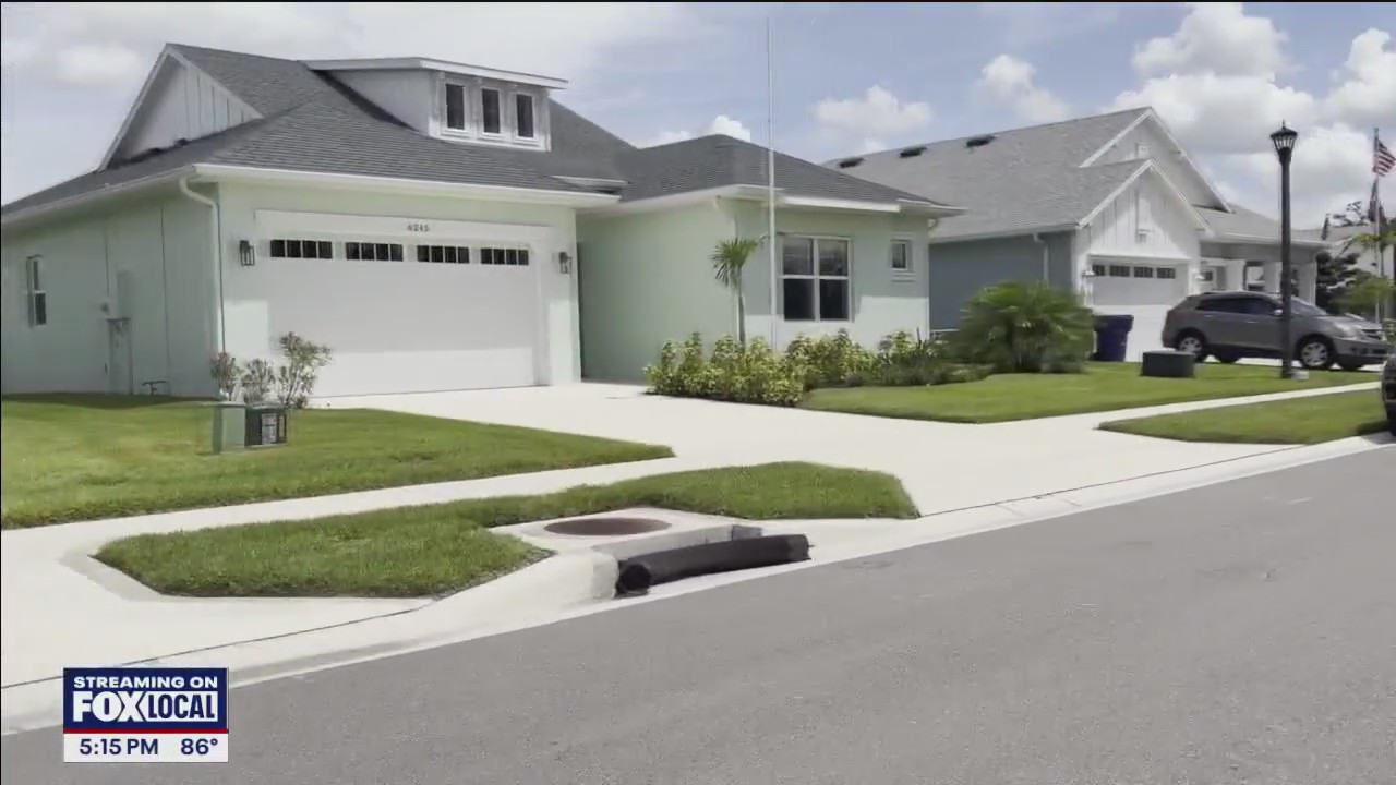 2 families receive mortgage free homes