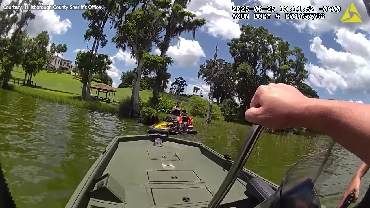 2 rescued from gator-infested waters