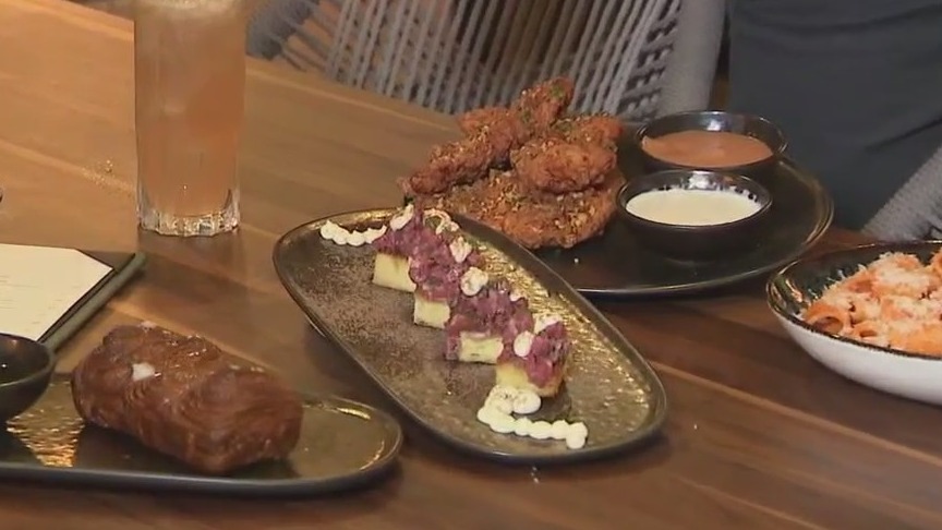 NFL stars serving up food at The Guest House