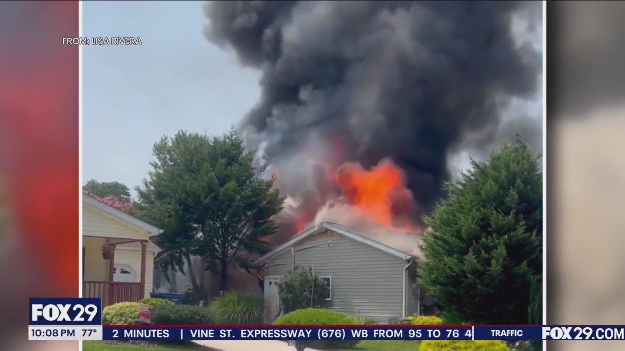 Woman gardening when her house catches fire in Atlantic County