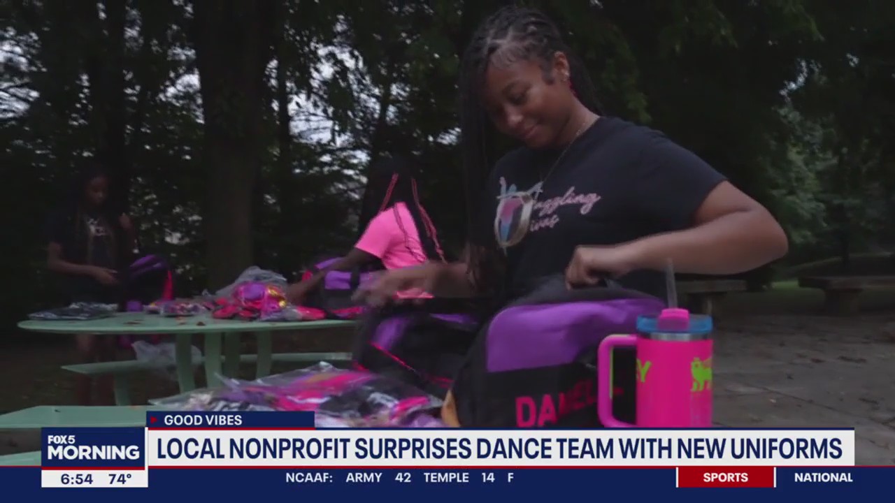 Local nonprofit surprises dance team with uniforms
