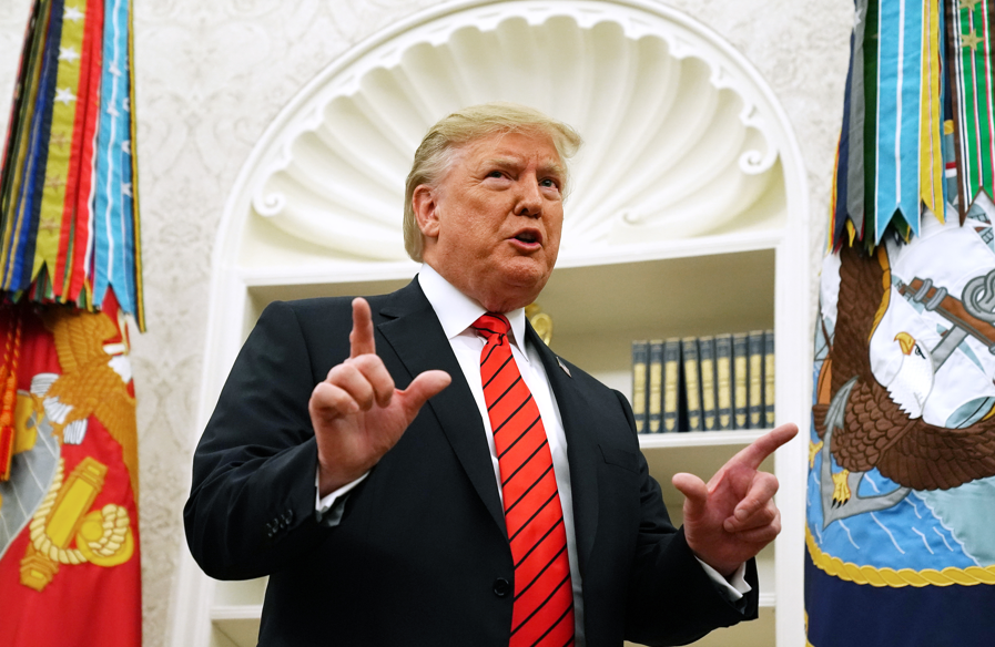 DOJ warned Trump he's named in Epstein files