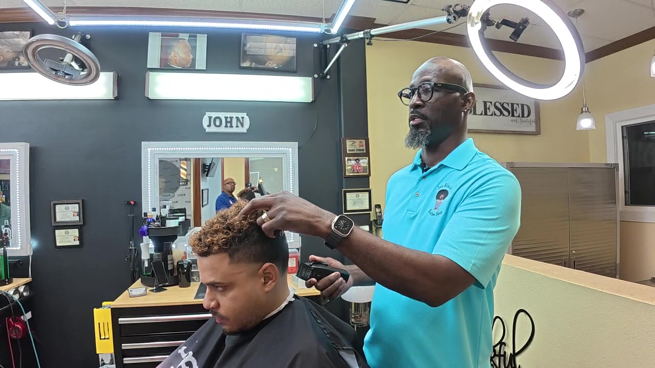 Hurricane Katrina leads Joe Black Barbershop owner to Houston