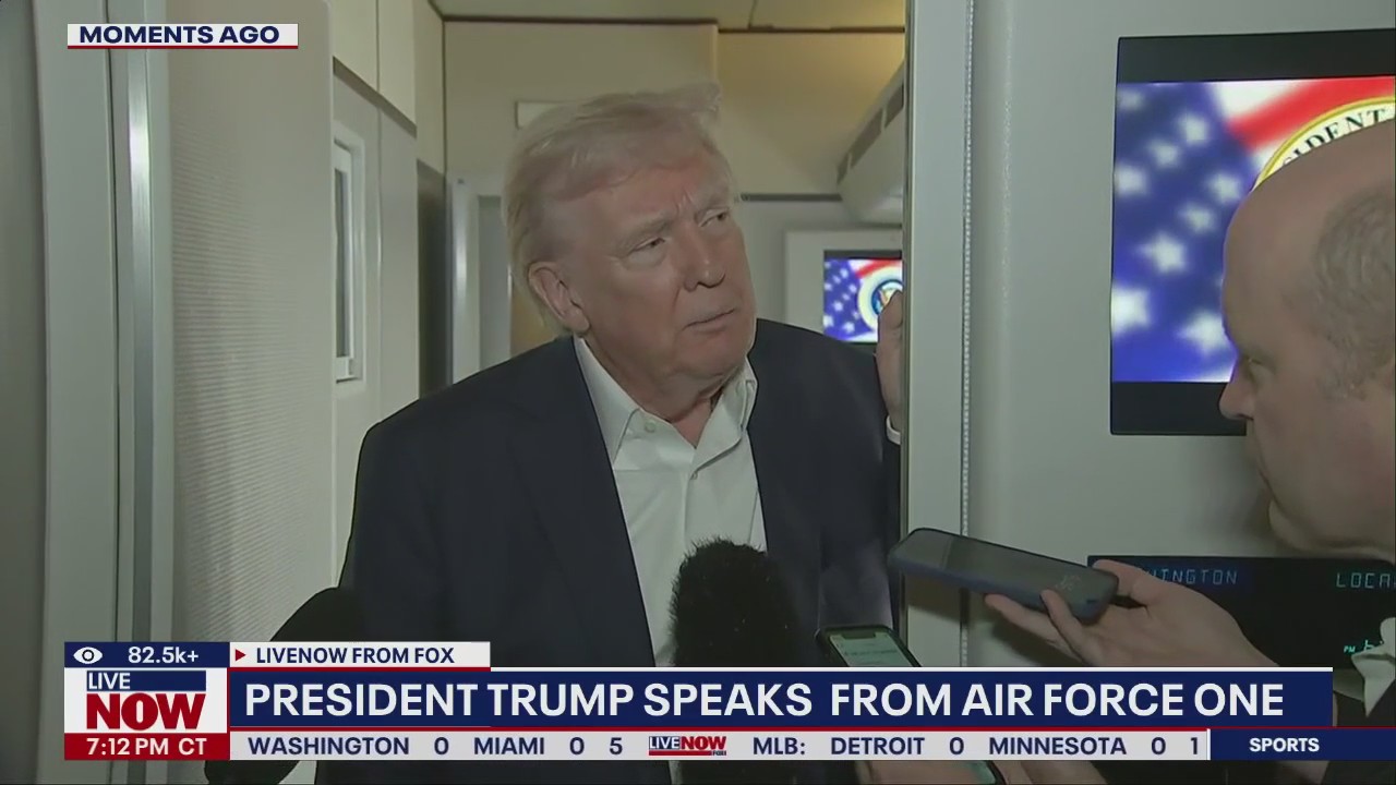 President Trump speaks to reporters on AF1