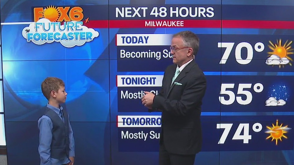 Elliot helps Rob Haswell with the weather