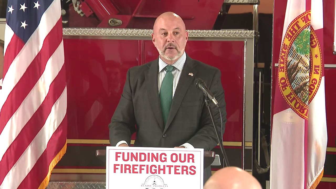 CFO presents checks to 16 Florida fire departments
