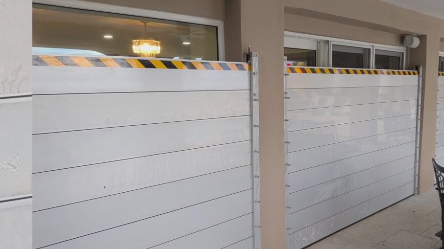 Friends join forces to create flood barrier system