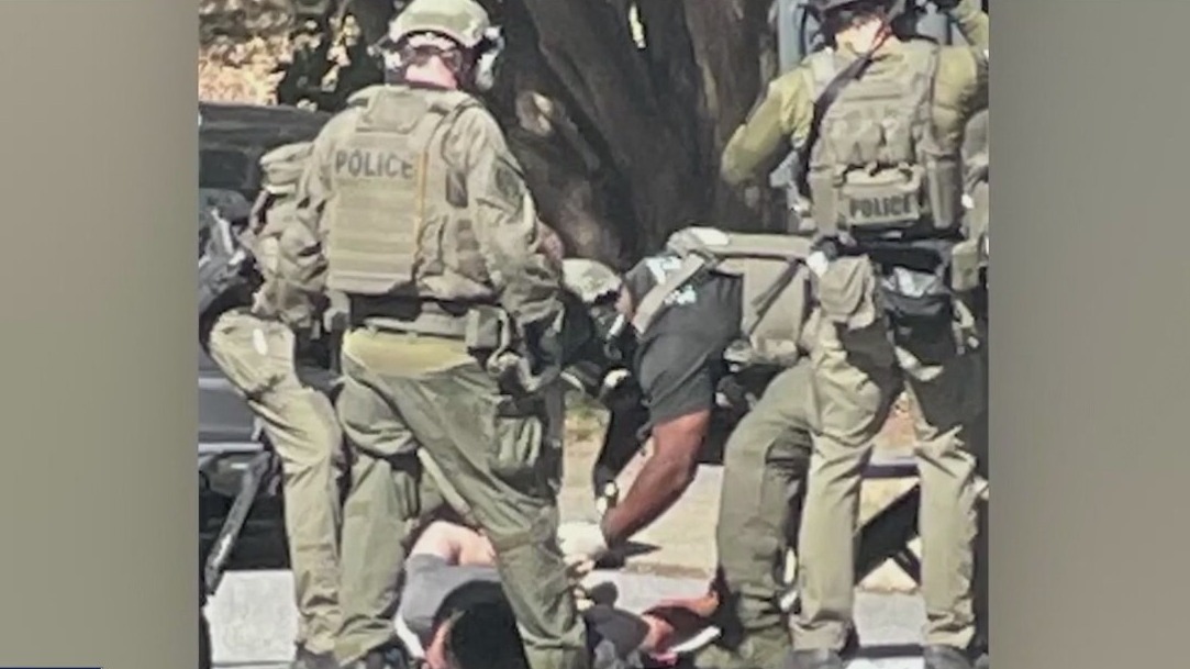 Man arrested after officer grazed by bullet in Sandy Springs