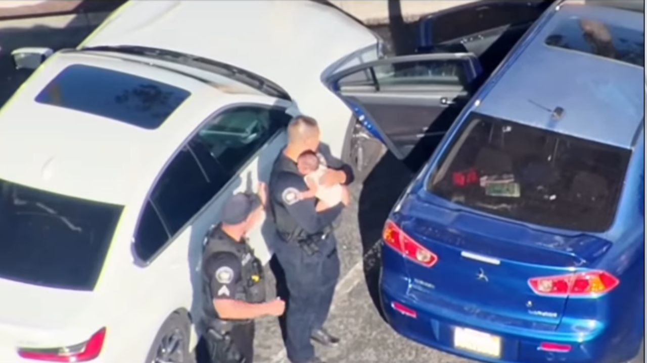 Newborn rescued after being left alone in hot car