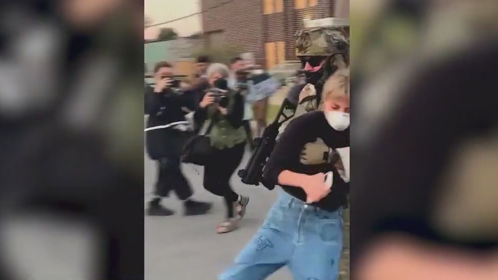 Woman thrown to ground during ICE protest in suburban Chicago