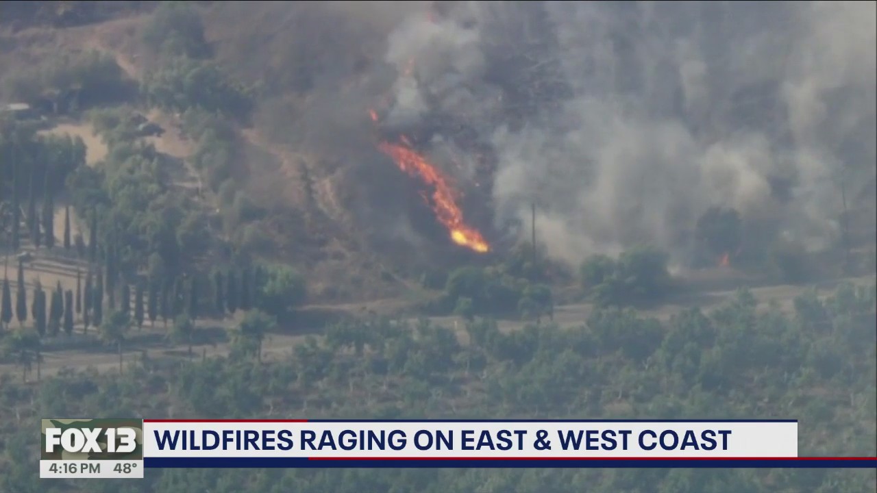 Wildfires raging on East, West Coast