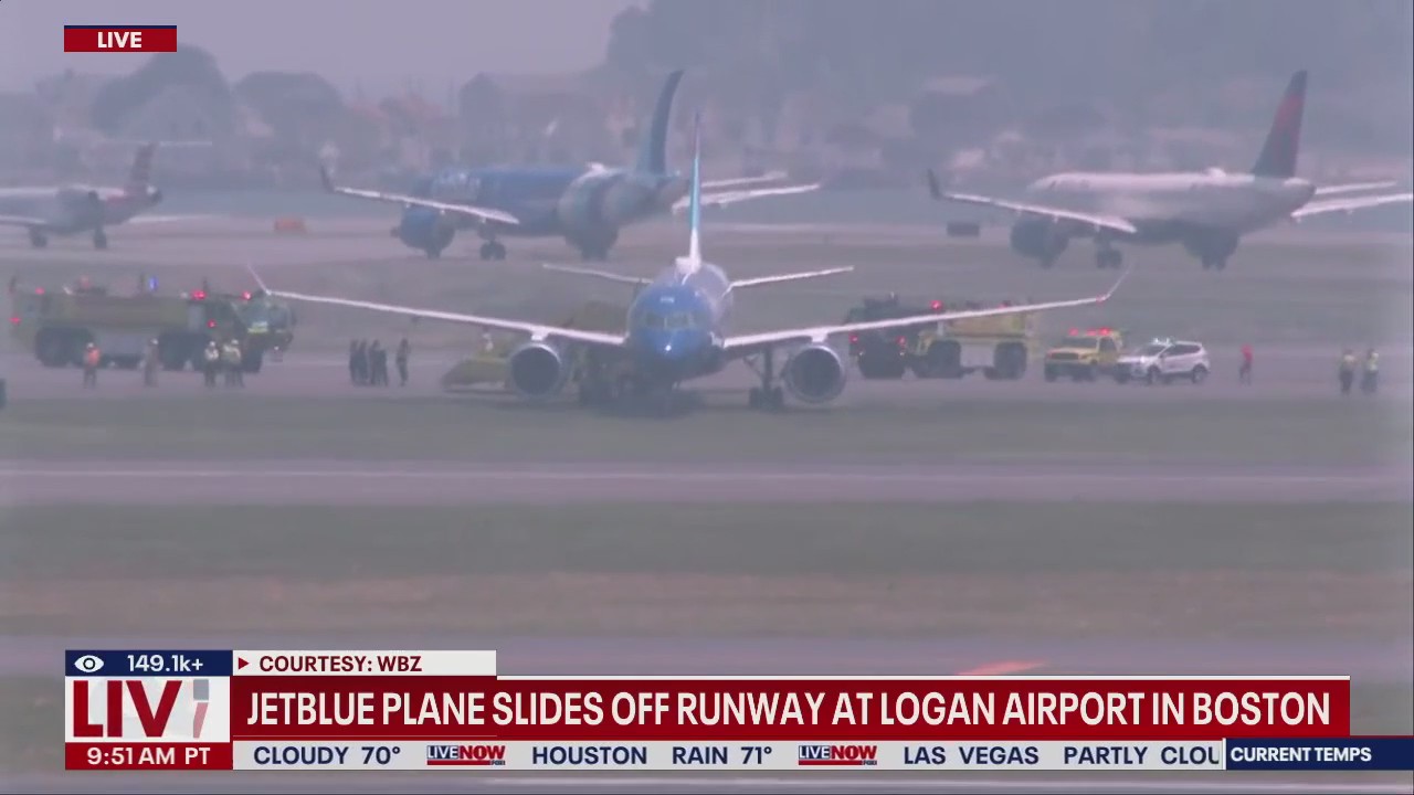JetBlue plane rolls off runway at Boston airport