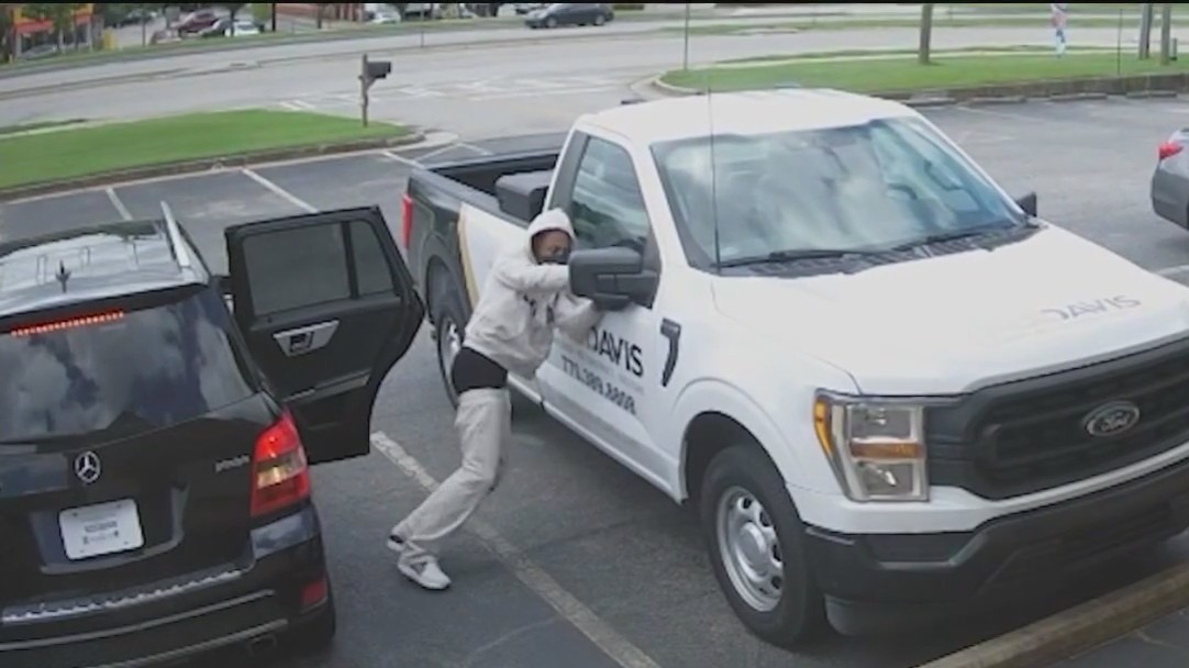Masked man stalks bank customer