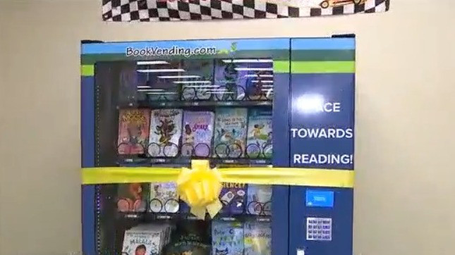NASCAR driver donating book vending machine