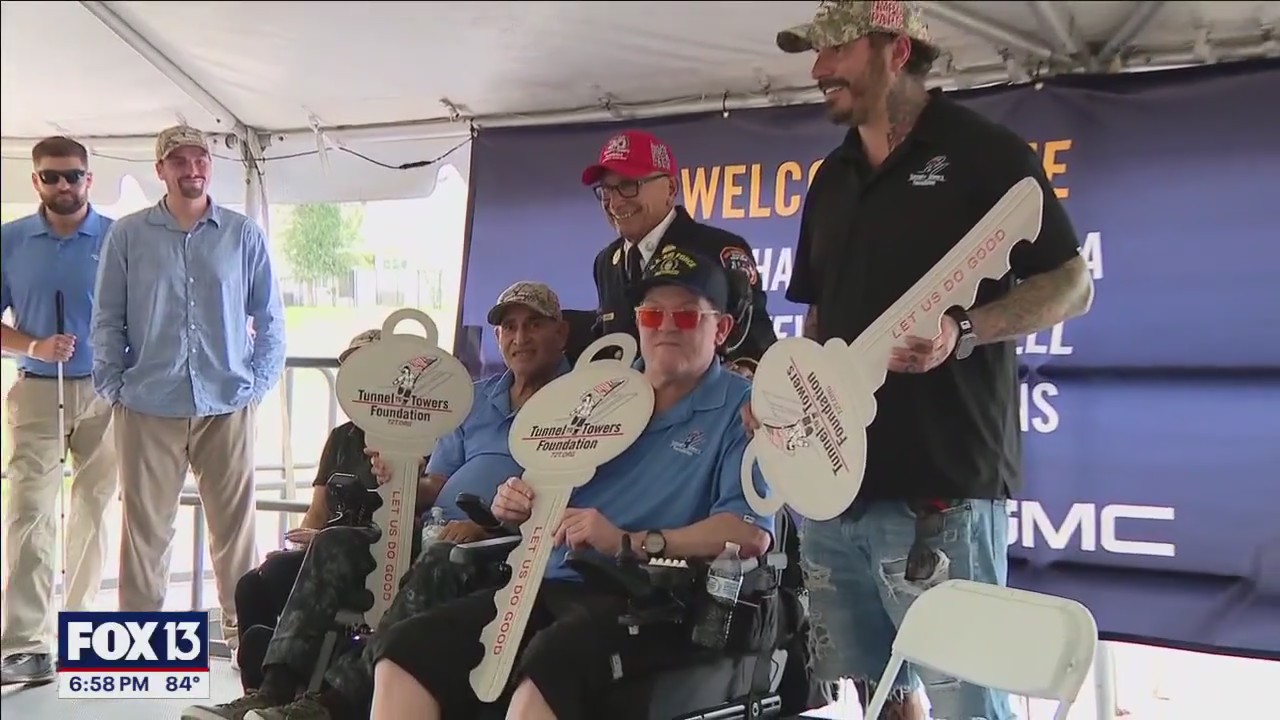 Three disabled veterans receive new homes