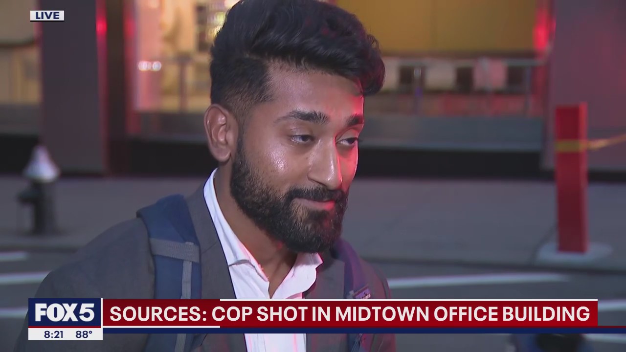 NYPD officer, 36, with pregnant wife, 2 kids killed in Midtown shooting NYPD officer, 36, with pregnant wife, 2 kids killed in Midtown shooting