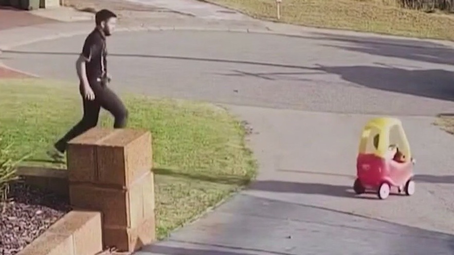 Dad saves child and lawn mower