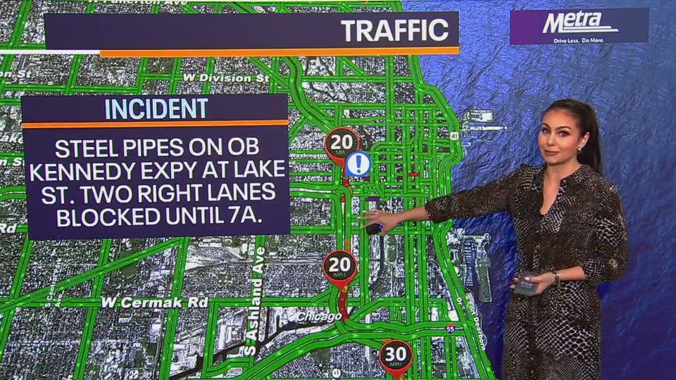 Steel pipes block outbound lanes of Kennedy Expressway during rush hour