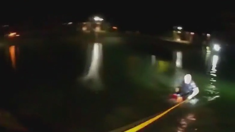 Dramatic rescue of man trapped in sinking car caught on camera