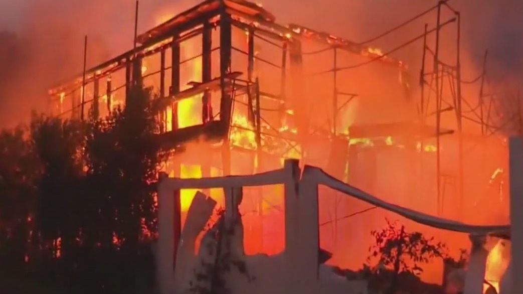 Deadly wildfires leave trail of destruction in Los Angeles area