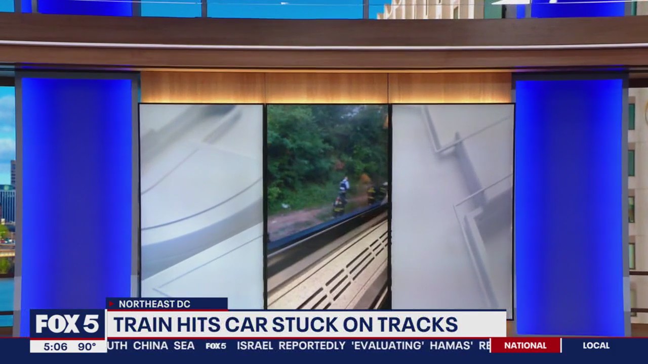 Amtrak hits car stuck on tracks