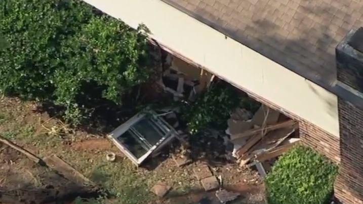Car crashes into Tucker home